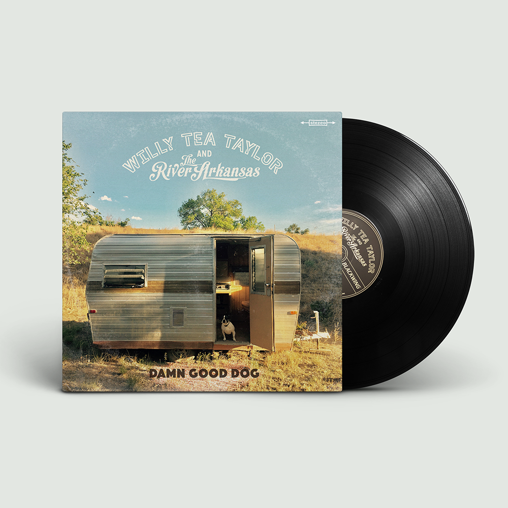 Vinyl record with a cover featuring a trailer and text on a light gray background